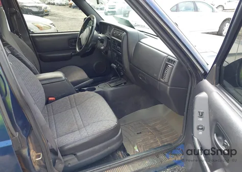 2000 Jeep Cherokee Sport z USA, uszkodzony, nr VIN 1J4FF48S0YL258657